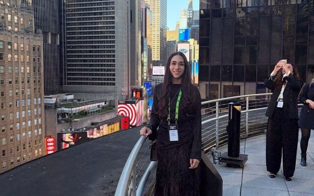 Tania Sheikh photographed above Time Square in New York.