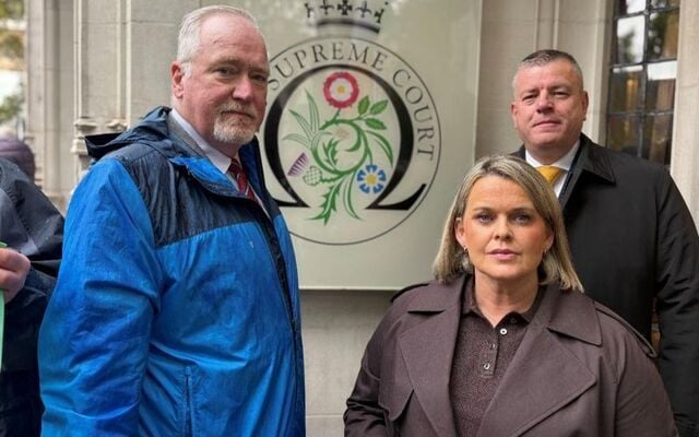 National AOH President Sean Pender (left) with Clare Loughran (center), daughter of murdered GAA chairman Seán Brown, and Solicitor Niall Murphy (right) at the UK Supreme Court in London on October 27, 2026, as the Brown family continues its 29-year fight for truth and justice concerning his 1997 murder.