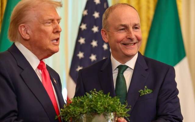 March 12, 2025: Ireland\'s Taoiseach Micheal Martin presents US President Donald Trump a bowl of shamrock in the East Room of the White House.