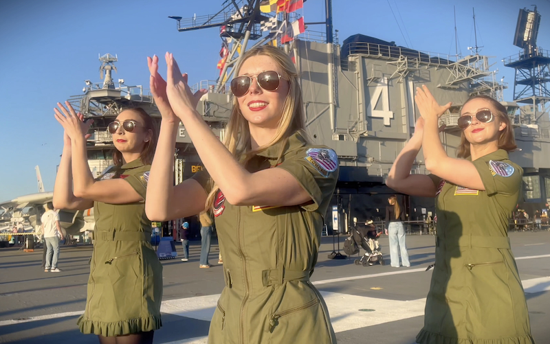 Fusion Fighters release cinematic “Danger Zone” dance film shot on USS Midway flight deck