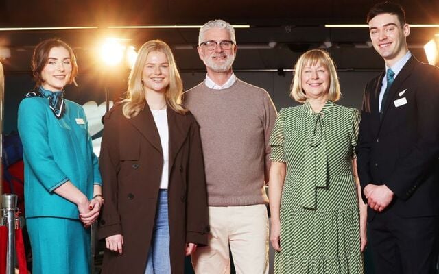 Aer Lingus crew members welcomed the family of Best Actress winner, Jessie Buckley, - Lily, Tim and Marina -  as they boarded Aer Lingus flight to LA for the Oscars.