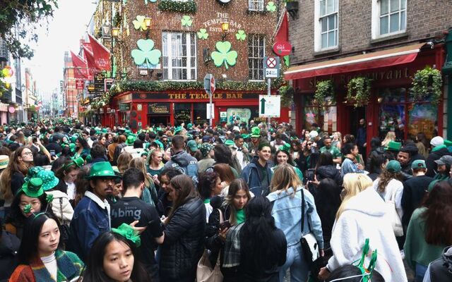 March 17, 2026: Tourists and locals in Temple Bar Square in Dublin after the end of the city\'s Saint Patrick\'s Day parade.
