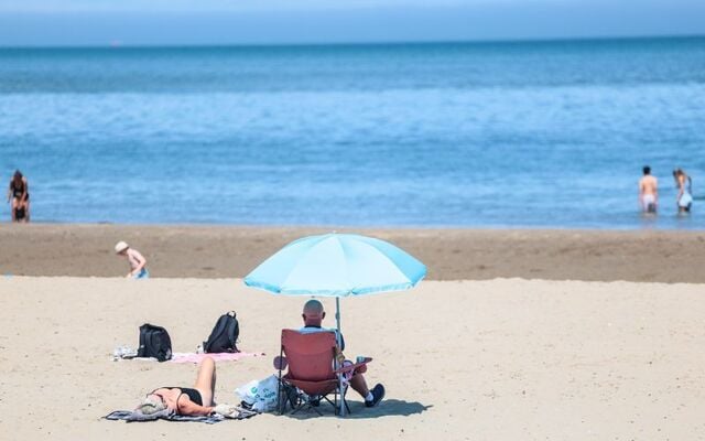 Enjoying the sun on Sandymount Strand, in Dublin.