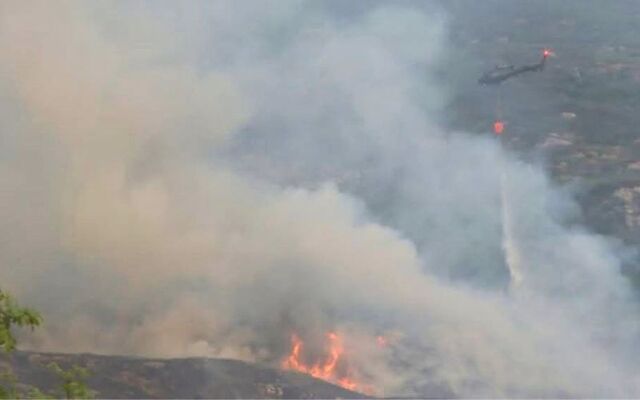 Emergency crews tackle the wildfire that broke out at Killarney National Park in Co Kerry.
