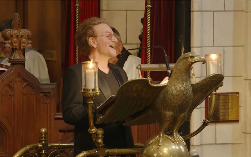 Bono raises eyebrows with odd moment at Hansard funeral