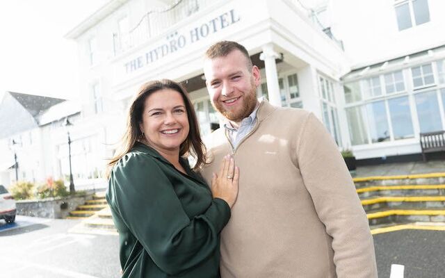 Mary Timby and Jay Mangan in front of the Hydro Hotel.