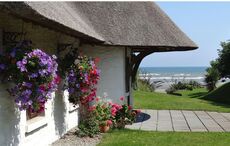 Escape to these luxury beachside thatched cottages in County Meath