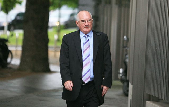 Former Anglo Irish Bank executive Willie McAteer on his way into court this morning.