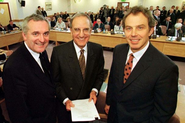 Taoiseach Bertie Ahern, Senator George Mitchell and British Prime Minister Tony Blair at Castle Buildings after they signed the Good Friday Agreement in 1998.