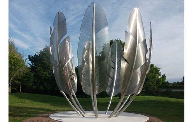 Alex Pentek's sculpture, "Kindred Spirits," in Midleton, County Cork. (2015. Stainless steel / LED lighting. H.6m).
