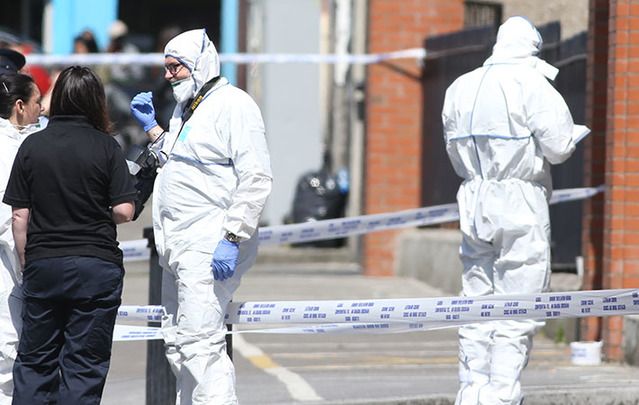 Gardai at the scene of the shooting where Gareth Hutch was gunned down and killed last week in Dublin.