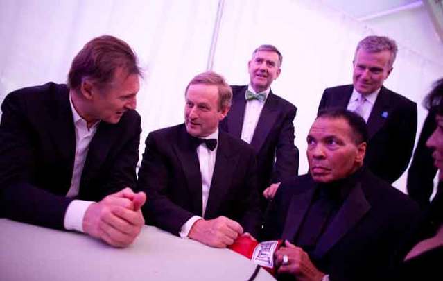 Liam Neeson, Enda Kenny, and Muhammad Ali at the 2011 American Ireland Fund New York Gala, at which Muhammad Ali received The American Ireland Fund Humanitarian Award. 