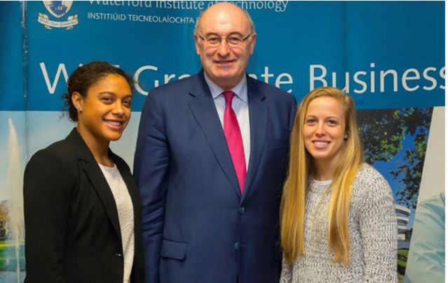Pictured with Phil Hogan, EU Commissioner are Victory Scholars Jazmen Boone (left) and Katie Fox (right)