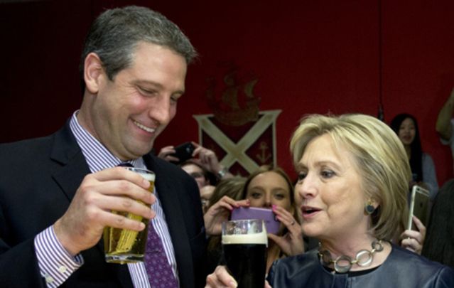 Rep. Tim Ryan (D-Ohio) and Hillary Clinton have a beer March 12 in a packed O'Donold's Irish Pub and Grill in Youngstown, Ohio.