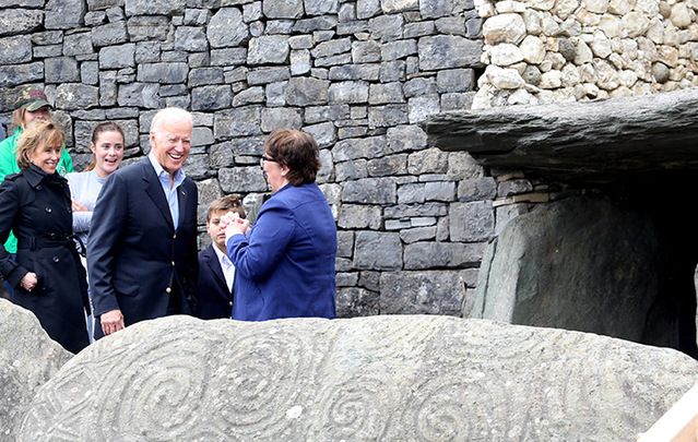 Vice President Joe Biden is given a tour by the local historian Claire Tuffy on his visit to Newgrange, in County Meath, morning his family.
