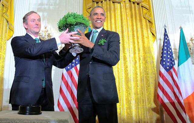 Taoiseach and Fine Gael leader Enda Kenny gives the traditional bowl of Shamrock to President Barack Obama in the White house Washington USA.