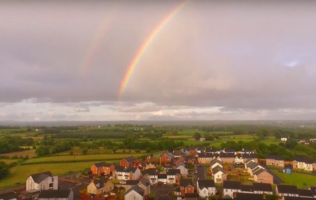 A shot from Martin McKenna’s YouTube video showing a rainbow above Maghera, Northern Ireland.