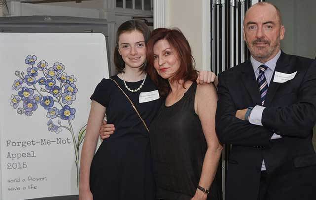 Maureen Dowd (center) with Irish family Kathleen and Ciaran Staunton at Rory Staunton Foundation event.