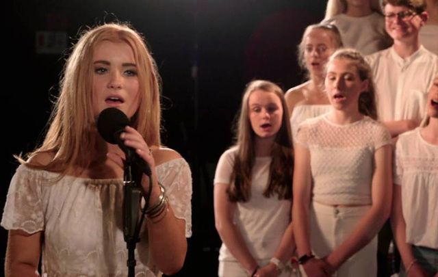 Shannon Bryan and a choir of Colaiste Lurgan student sing Adele\'s \"Hello.\"