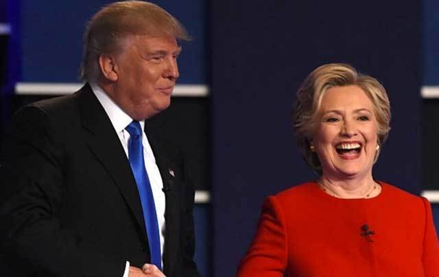 Democratic nominee Hillary Clinton (R) shakes hands with Republican nominee Donald Trump after the first presidential debate at Hofstra University in Hempstead, New York on September 26.