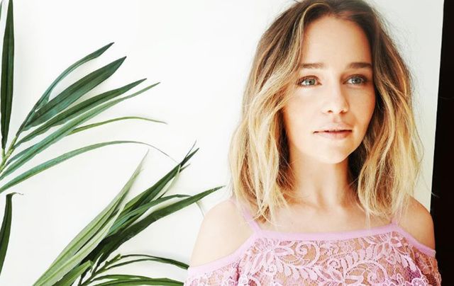 Emilia Clarke star of "Game of Thrones" is back on site in Belfast.