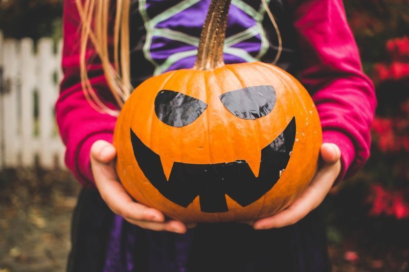 Turnip lanterns, false faces and a bin bag for a costume, Halloween in Ireland