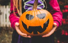 Turnip lanterns, false faces and a bin bag for a costume, Halloween in Ireland