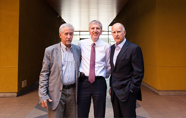 In this October, 2013 photo, Tom Hayden is pictured left with Máirtín Ó Muilleoir, who was at the time Lord Mayor of Belfast and visiting California, and California Governor Jerry Brown.
