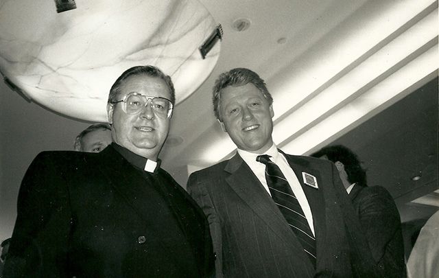Fr. Sean McManus and Bill Clinton at the 1992 forum.