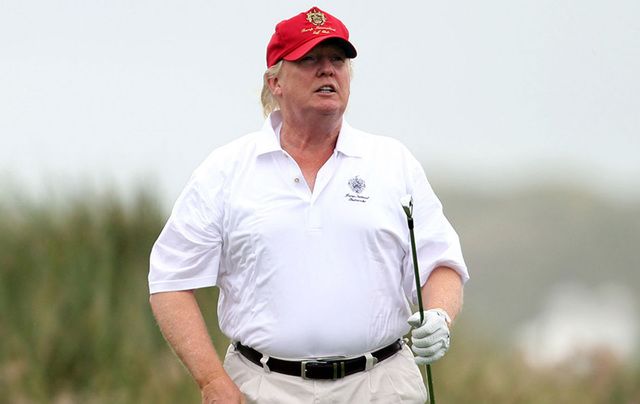Donald Trump stepping out on the golf course.