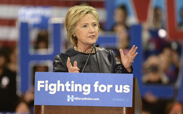 Hillary Clinton, \"Fighting for US,\" on the campaign trail.