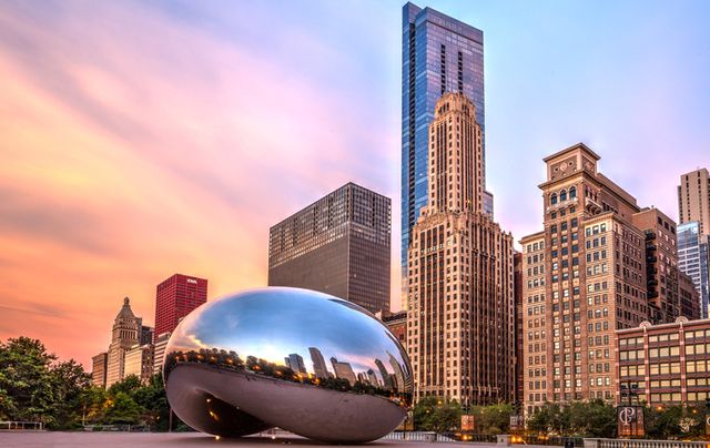 Picture of Cloud Gate or the 'Bean' as it is commonly known in front of the Chicago skyline