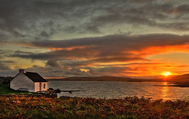 Sun setting over Sneem, County Galway.