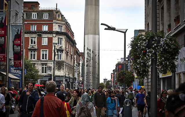 Dublin One: A view of the Spire on O\'Connell Street, from the pedestrianized shopping area, Henry Street.