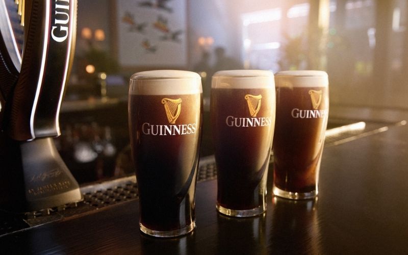 Is there a reason Guinness cans are just short of a full pint