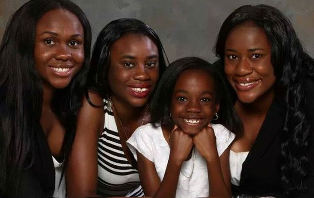 Madra Oo and her three sisters.