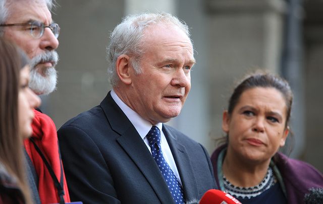 Sinn Fein\'s Martin McGuinness, flanked by Gerry Adams and Mary Lou McDonald outside the Dail, in Dublin. 