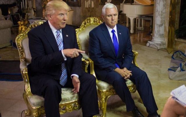 They're literally sitting on golden thrones! Donald Trump and Mike Pence.