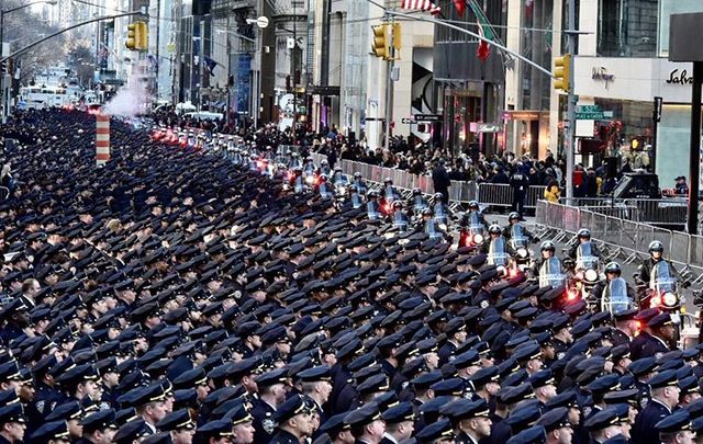 Thousands of police officers lining Fifth Ave this morning. 