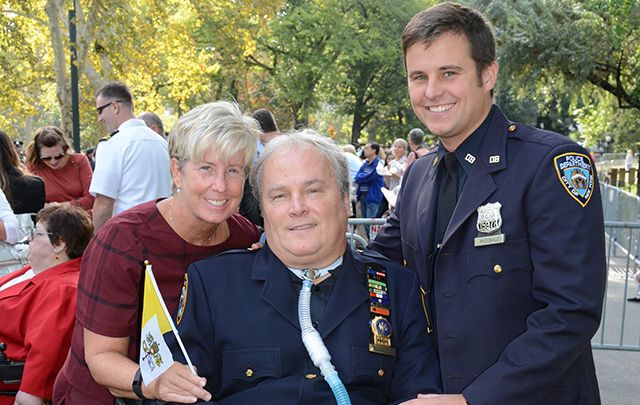 NYPD Detective Steven McDonald, with his wife Patti-Ann and son Conor, march in the 2014 St. Patrick’s Day parade.