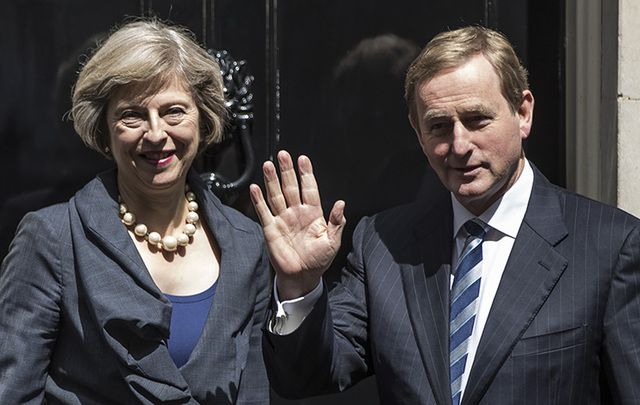 British Prime Minister Theresa May and Taoiseach Enda Kenny stand outside 10 Downing Street.