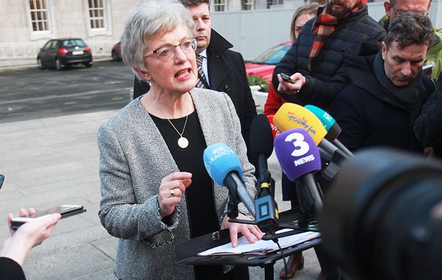 Minister for Children Katherine Zappone meets the press in Dublin on Monday.