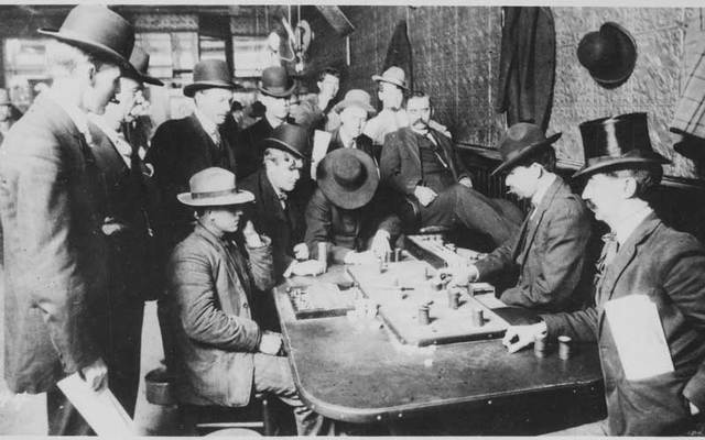 Irish gambler Johnny Murphy, one of the men who killed the notorious James Leavy, is seen in this staged photograph of a faro game at Bisbee’s Orient Saloon around 1902 or 1903. Murphy is dealing faro second from right. The building is still in use today as Café Roka at 35 Main Street.