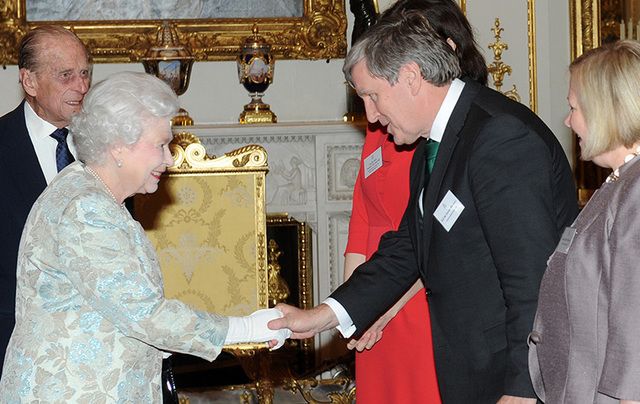 Former Ambassador to the United Kingdom Dan Mulhall shaking Queen Elizabeth II\'s hand. 