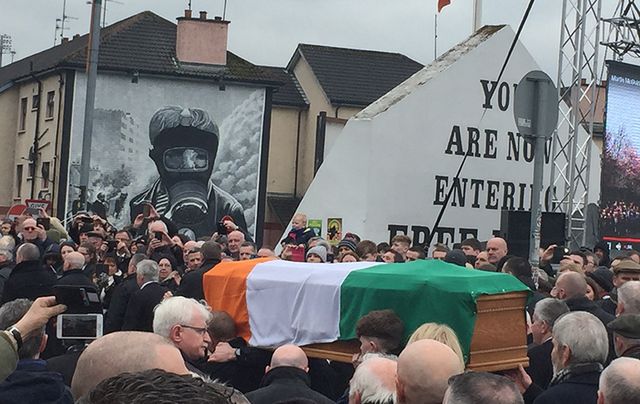Martin McGuiness\' funeral passes the iconic Free Derry corner.