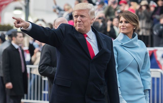 President Donald Trump and Melania greeting the crowds at his inauguration. 
