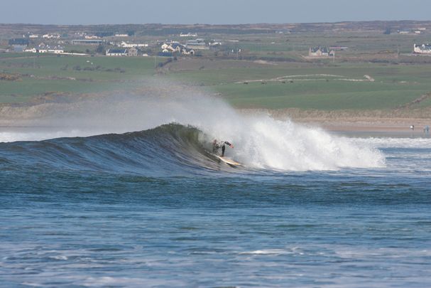 Surfing the waves at Lahinch in County Clare