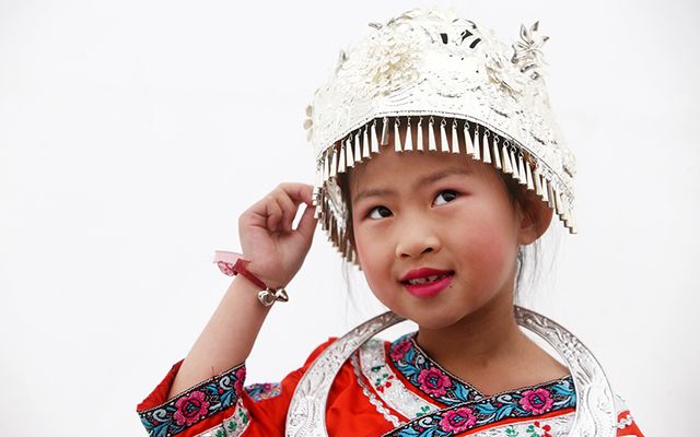 Yu Ying Yang (7) from Dublin, a dancer from the Chinese Children\'s Dance Academy in front of the Custom House as part of Cruinniú na Cásca. 