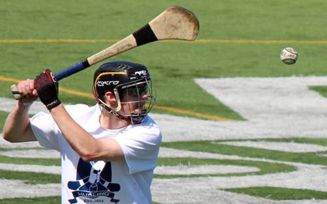 An Irish American tries his hand at hurling. 