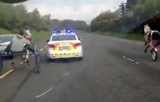 Wild video as Irish police try to stop travellers horse race on a busy highway
